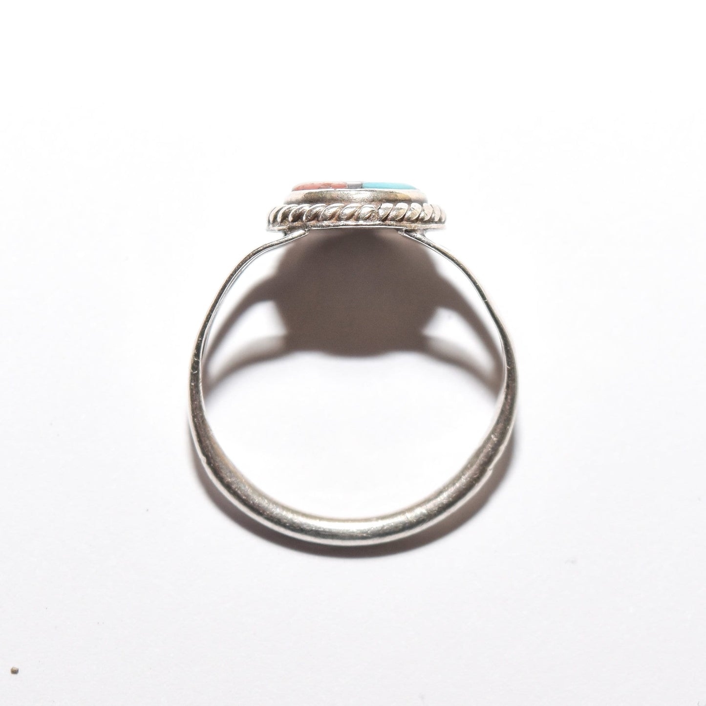 Native American Zuni Sun Face ring in sterling silver with inlay detail, size 5.25 US, perfect for stacking, on a white background.