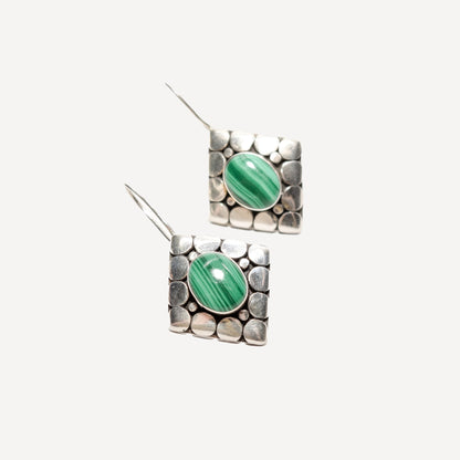 Alt text: Modernist sterling silver malachite dangle earrings with cute gemstone design, 1.5 inches long on a white background.