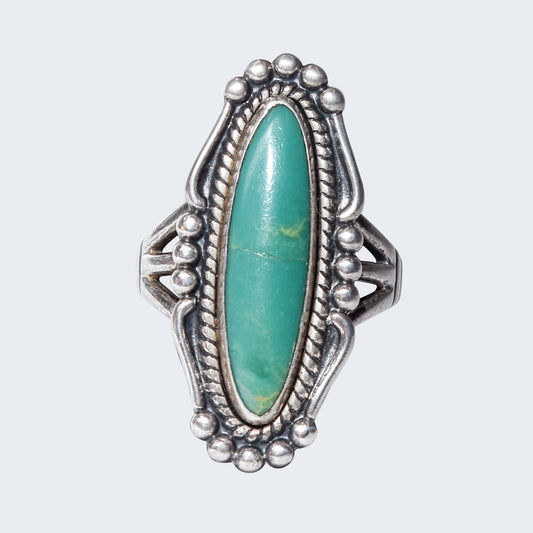 Native American sterling silver turquoise marquise ring, Southwestern jewelry design, size 8 US, on a neutral background.