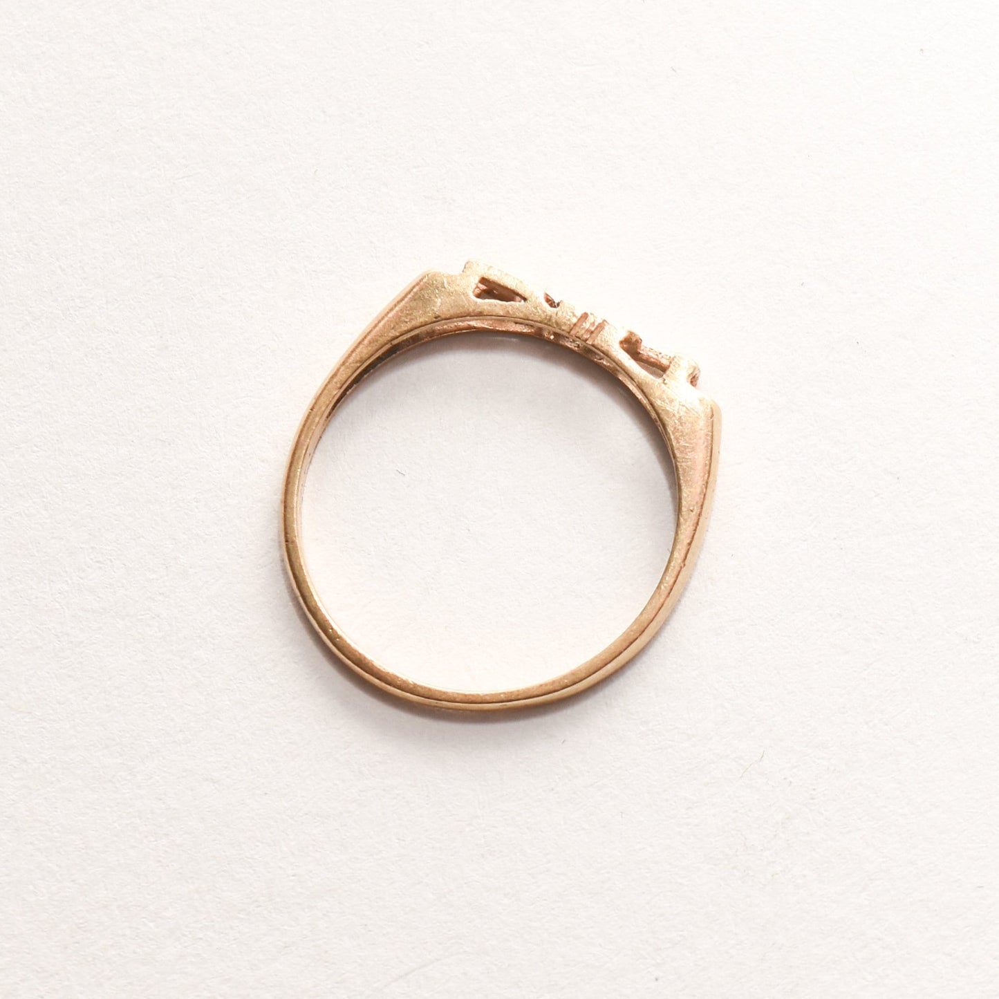 Minimalist 14K yellow gold 'LOVE' ring on a white background, cute stacking ring, perfect for Valentine's Day gift, size 6.75 US