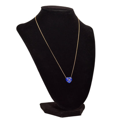 14K gold Tiffany & Co. lapis lazuli heart cross pendant on a minimalist necklace displayed on a black bust, 18 inches long.