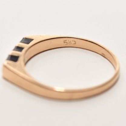 14K yellow gold stacking ring with minimalist black onyx inlay, size 5.5 US, shown on a white background.