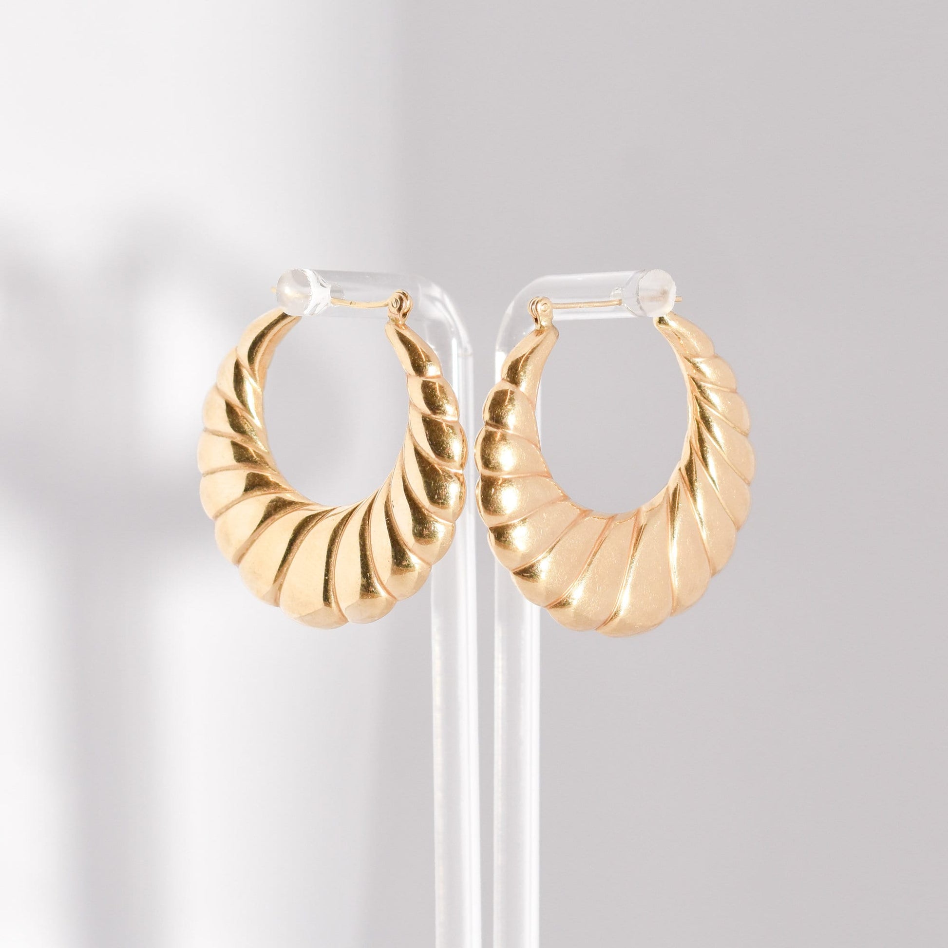 MCM 14K gold puffed scallop hoop earrings medium size on display, 36mm yellow gold estate jewelry.