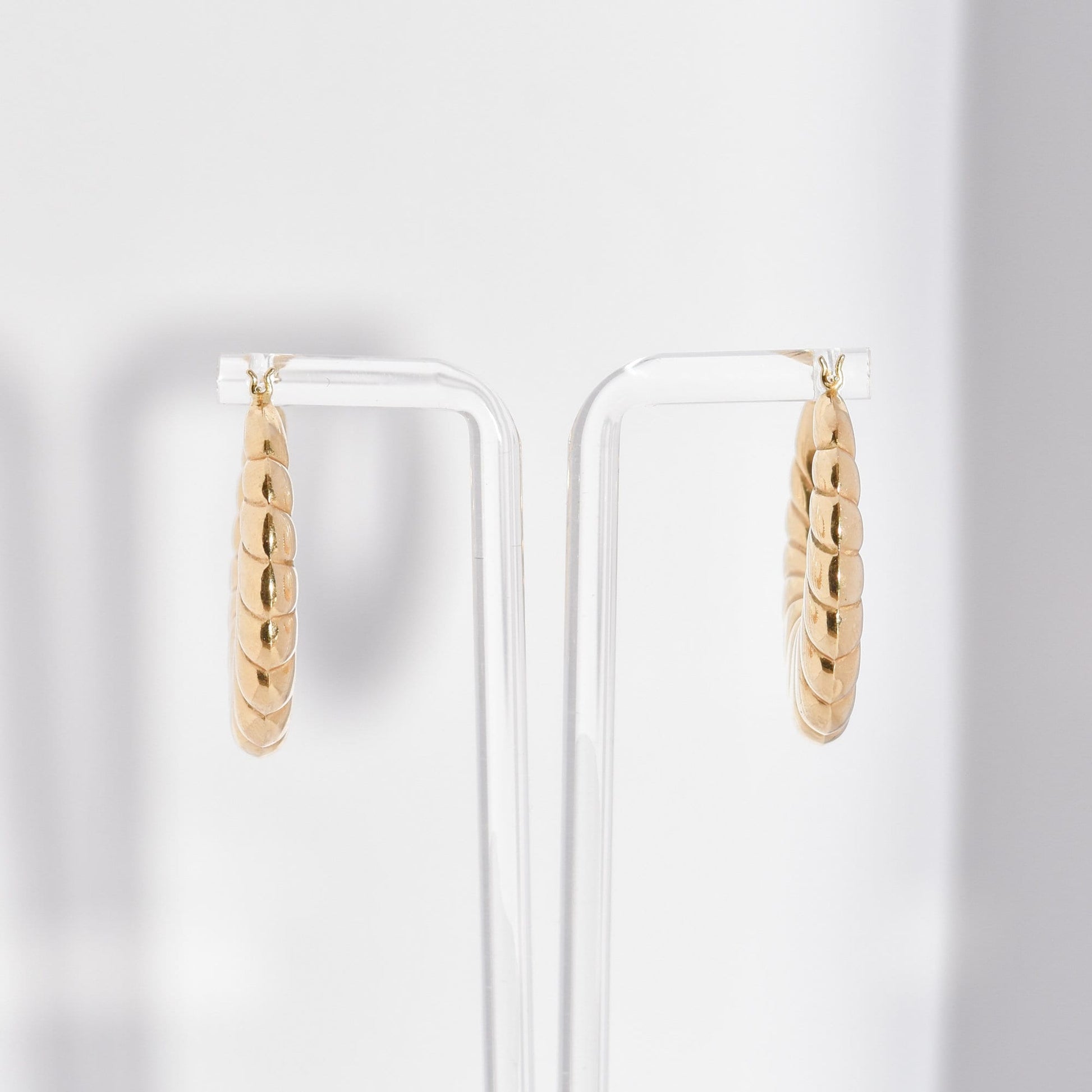 MCM 14K yellow gold puffed scallop hoop earrings, medium size, displayed on a white background, 36mm estate jewelry.